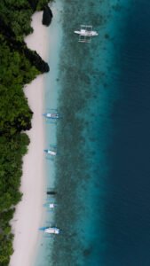 Couple walking on the beach at sunset, El Nido — Aubrey Stills Studio