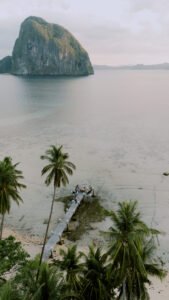 Couple walking on the beach at sunset, El Nido — Aubrey Stills Studio